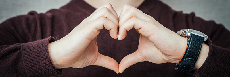 making a heart with hands